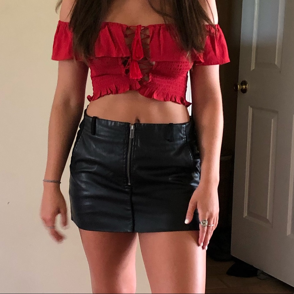 selling black leather skirt size 4